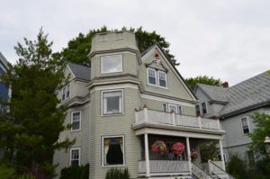  A large home with new wood gutters. 
